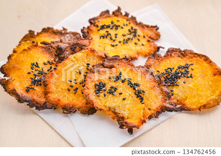 Sweet and salty sweet potato chips Sweet and salty sweet potato chips 134762456