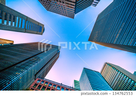 Tokyo cityscape in Japan. The gloom of the Japanese economy... Dusk approaches in Otemachi. Last day of work... Believe in tomorrow, head to that sky = 26th Tokyo cityscape in Japan. The gloom of the Japanese economy... Dusk approaches in Otemachi. Last day of work... Believe in tomorrow, head to that sky = 26th 134762553