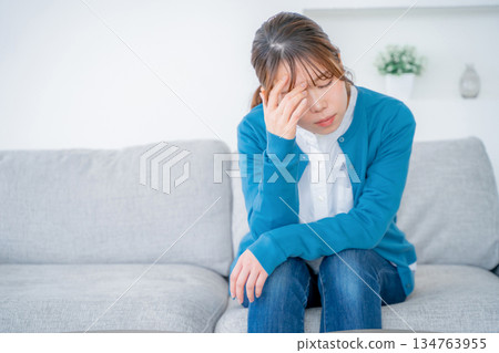 A woman with poor health A woman with poor health 134763955