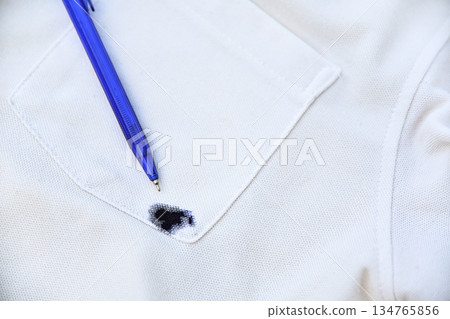 blue blue ink dirty stain  on white shirt for cleaning concept idea in work house 134765856