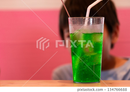A refreshing green sparkling drink for a hot summer day A refreshing green sparkling drink for a hot summer day 134766688