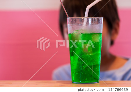A refreshing green sparkling drink for a hot summer day A refreshing green sparkling drink for a hot summer day 134766689