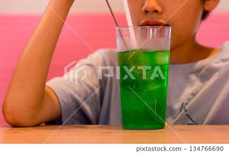 A refreshing green sparkling drink for a hot summer day A refreshing green sparkling drink for a hot summer day 134766690