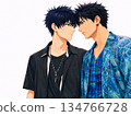 A tense boys' love illustration of two people gazing at each other with their faces close together 134766728