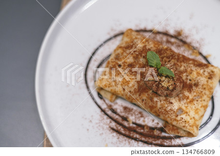 Crepes served on a plate Crepes served on a plate 134766809