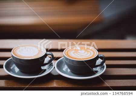 Two cups of cappuccino Two cups of cappuccino 134768594