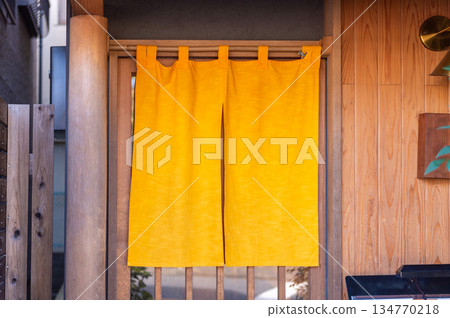 The curtain-like fabric that hangs in front of traditional Japanese restaurants and shops not only serves as a signboard, but holds a larger meaning, 134770218