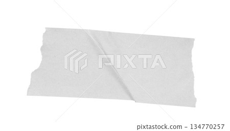 White adhesive masking tape piece with torn edges on transparent alpha channel background showing crinkled texture White adhesive masking tape piece with torn edges on transparent alpha channel background showing crinkled texture 134770257