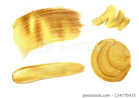 Set of golden paint strokes, isolated on white. Set of golden paint strokes, isolated on white. 134770435