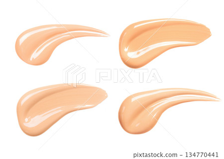 Three smears of foundation 134770441