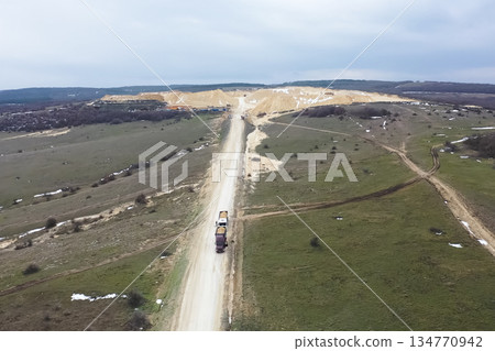 Clay quarry, top view. Clay mining in quarry. Clay quarry, top view. Clay mining in quarry. 134770942