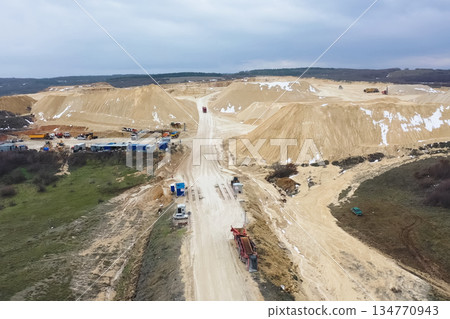 Clay quarry, top view. Clay mining in quarry. Clay quarry, top view. Clay mining in quarry. 134770943