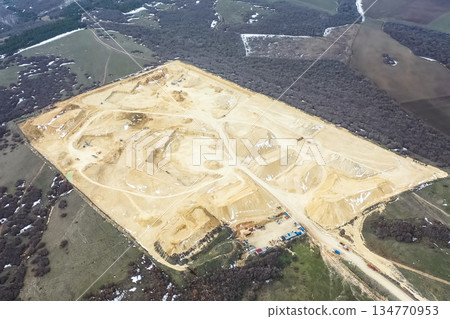 Clay quarry, top view. Clay mining in quarry. Clay quarry, top view. Clay mining in quarry. 134770953