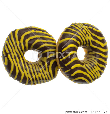 Two American donuts covered with chocolate and with yellow stripes on a white background Two American donuts covered with chocolate and with yellow stripes on a white background 134771174