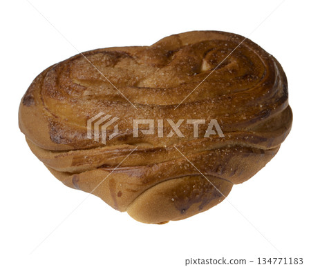 Appetizing baked bun on a white plate isolated 134771183