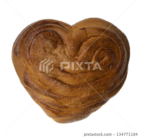 Appetizing baked bun on a white plate isolated Appetizing baked bun on a white plate isolated 134771184