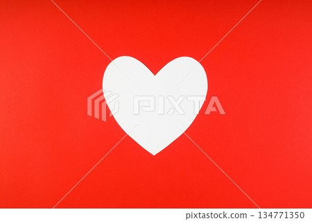 Empty white heart on a red background. Happy Valentines day, White Heart from paper. Good Holiday Card. Empty white heart on a red background. Happy Valentines day, White Heart from paper. Good Holiday Card. 134771350