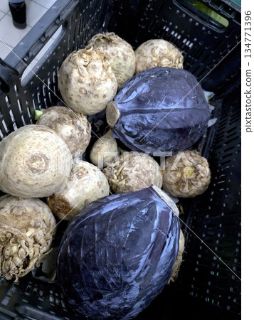 Celery and Cabbage Collected in a Basket at a Local Market in the Afternoon Celery and Cabbage Collected in a Basket at a Local Market in the Afternoon 134771396