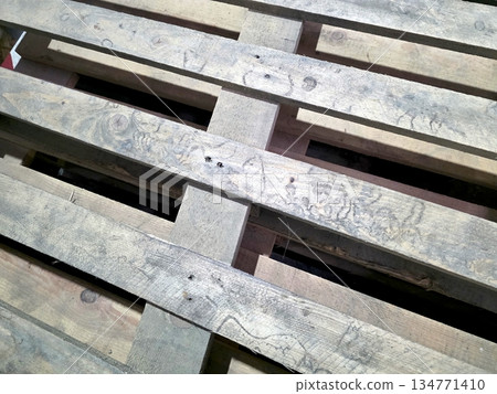 Wood Pallet Structure Viewed From Above Showing Wooden Slats and Gaps Wood Pallet Structure Viewed From Above Showing Wooden Slats and Gaps 134771410