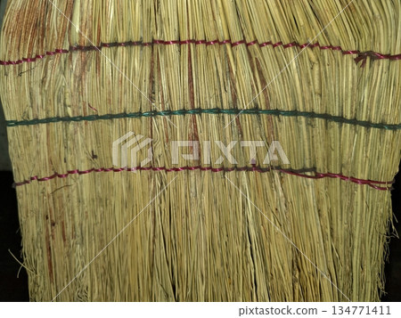 Broom Sorghum Tied Together for Making Traditional Brooms in a Rural Setting With Natural Materials 134771411