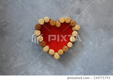 Valentine heart from wine corks on stone background Valentine heart from wine corks on stone background 134771755