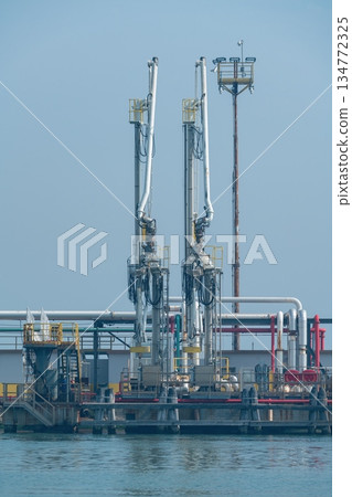 Marine Loading Arms at Oil Terminal in Porto Marghera, Venice, Italy Marine Loading Arms at Oil Terminal in Porto Marghera, Venice, Italy 134772325