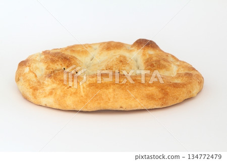 Turkish ramadan pita bread, isolated on white background Turkish ramadan pita bread, isolated on white background 134772479