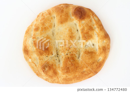 Turkish ramadan pita bread, isolated on white background Turkish ramadan pita bread, isolated on white background 134772480