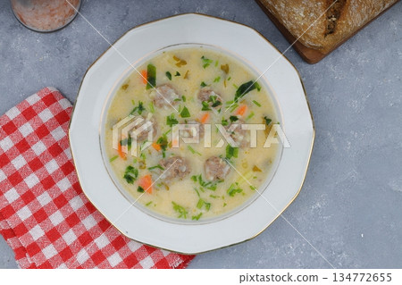 Meatball soup with carrot and potatoes named eksili terbiyeli sulu kofte or eksili kofte Meatball soup with carrot and potatoes named eksili terbiyeli sulu kofte or eksili kofte 134772655