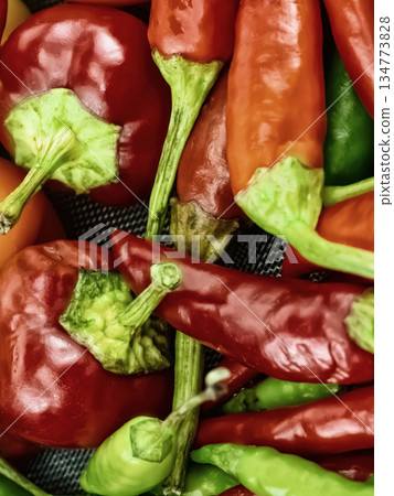 assorted hot peppers red and green close-up, fresh vegetables assorted hot peppers red and green close-up, fresh vegetables 134773828