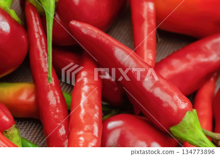 bright chili pods hot pepper red many vegetable asia pattern 134773896