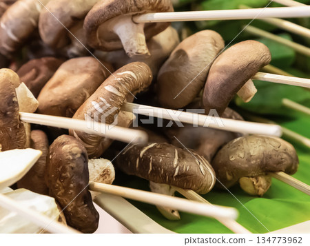 assorted mushroom skewers and vegetables on wooden skewers selective focus assorted mushroom skewers and vegetables on wooden skewers selective focus 134773962
