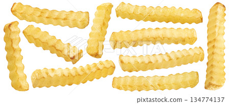 Crinkle french fries isolated on white background, falling crunchy fried potato sticks, full depth of field 134774137
