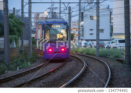 The Toden Arakawa Line running through the downtown area in the evening The Toden Arakawa Line running through the downtown area in the evening 134774491