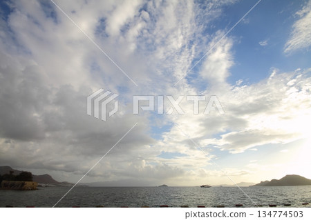 Seaside town of Turgutreis and spectacular sunsets Seaside town of Turgutreis and spectacular sunsets 134774503