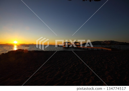 Old abandoned wooden fishing pier on the sea in the countryside 134774517