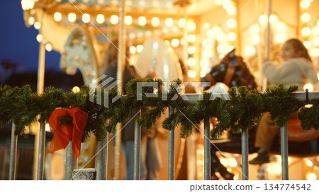 Christmas market ambiance with twinkling lights and handcrafted touches 134774542