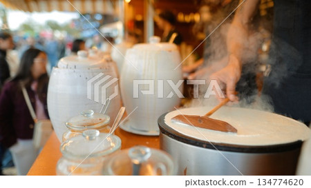 Dynamic kitchen moment showing spinning steam and sizzling spatula action Dynamic kitchen moment showing spinning steam and sizzling spatula action 134774620