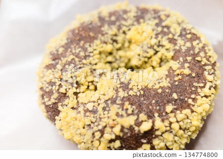 Chocolate donut crunch topping Chocolate donut crunch topping 134774800