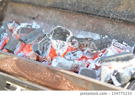 Charcoal fire for cooking at food stalls Charcoal fire for cooking at food stalls 134775233
