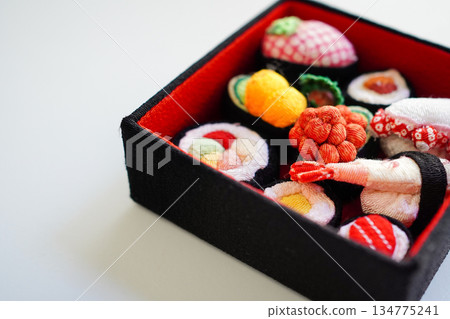 Assorted sushi made from cloth on a white background Assorted sushi made from cloth on a white background 134775241