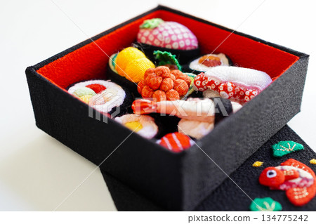 Assorted sushi made from cloth on a white background 134775242