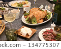 Roast chicken and roast beef lined up on the table 134775307