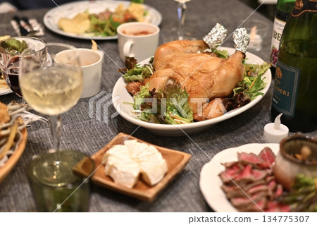 Roast chicken and roast beef lined up on the table Roast chicken and roast beef lined up on the table 134775307