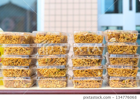 Stacks of packed fried noodles Stacks of packed fried noodles 134776068