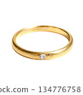 Simple gold wedding ring with single diamond. This elegant jewelry symbolizes love and an engagement commitment 134776758