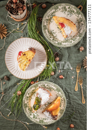 Slices of Bolo Rei or Kings Cake. Is a traditional Xmas cake made for Christmas, Carnavale or Mardi Gras Slices of Bolo Rei or Kings Cake. Is a traditional Xmas cake made for Christmas, Carnavale or Mardi Gras 134777111