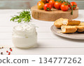 Organic cherry tomatoes with rosemary, swedish toasts and cream cheese 134777262