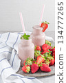 Strawberry milkshake or smoothie in glass jars 134777265