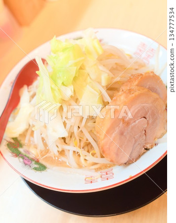 Jiro-style ramen with a mountain of vegetables and thickly sliced pork Jiro-style ramen with a mountain of vegetables and thickly sliced pork 134777534